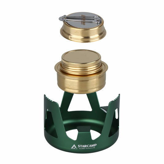 Green camping stove with gold top on a white background, featuring the Starcamp brand.