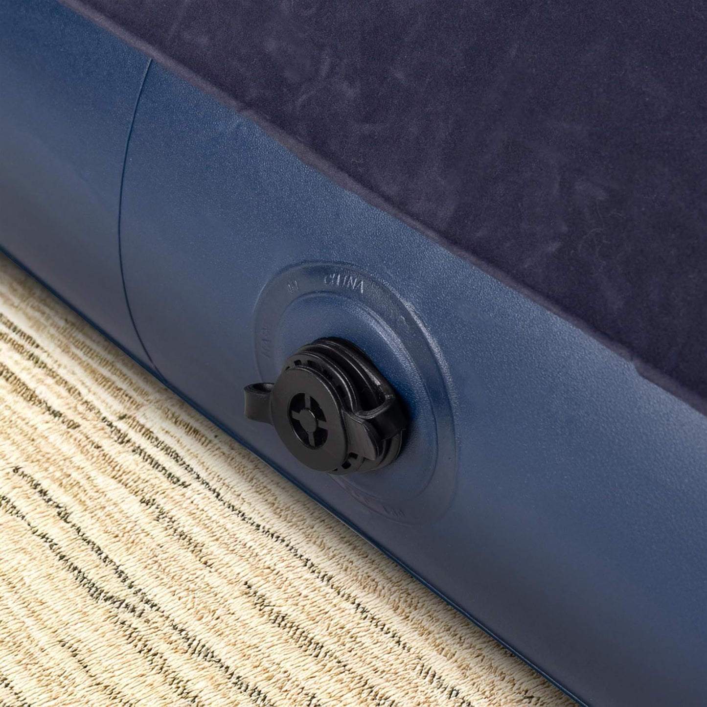 Avenli twin inflatable camping mattress deflated and folded to compact size for easy transport and storage
