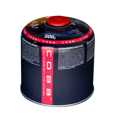 COBB 500g butane-propane blend gas canister in navy blue with red branding stripe and red self-seal screw-top valve cap