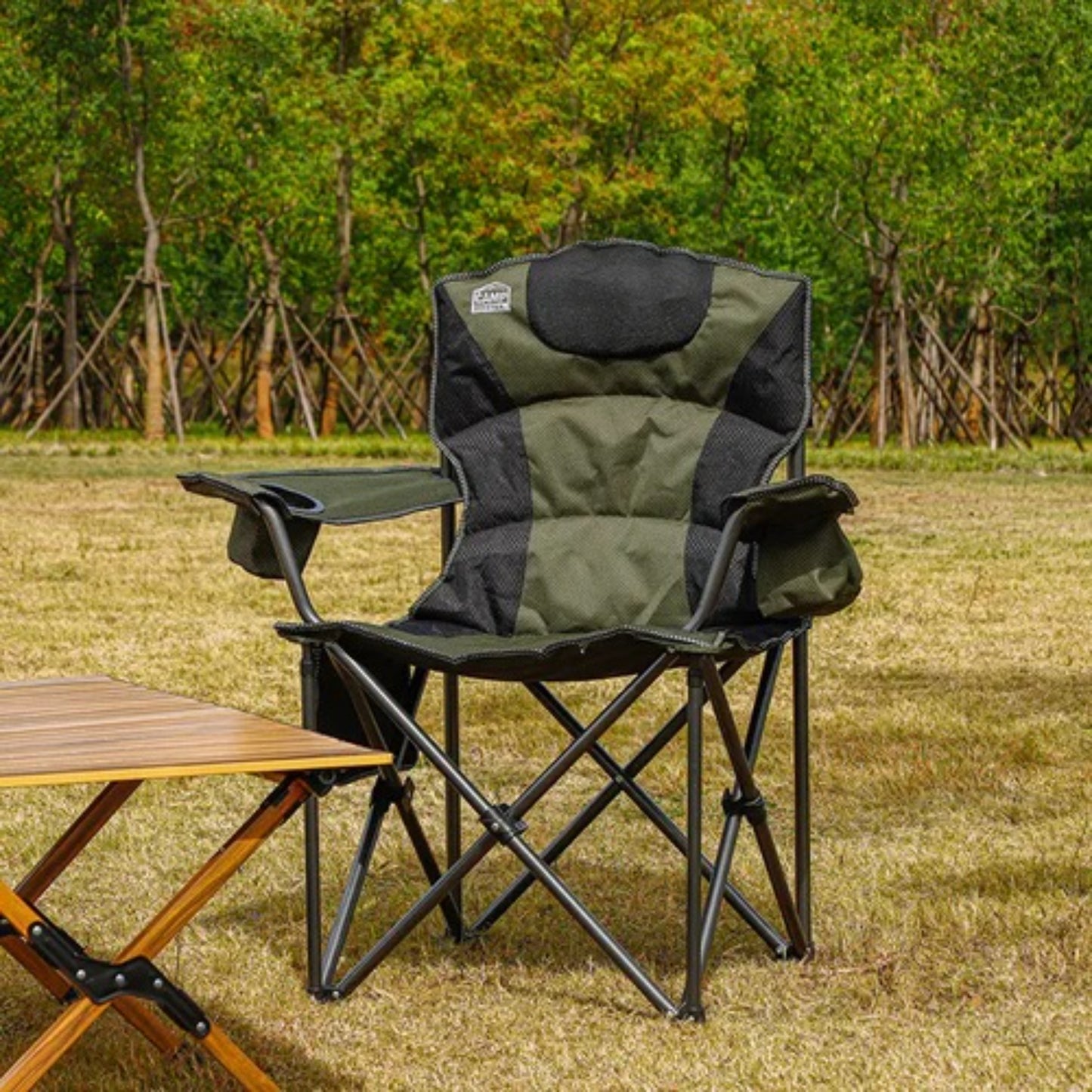 Close up of heavy duty camp chair padded headrest and backrest with mesh ventilation panels for outdoor comfort