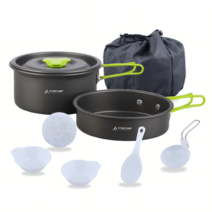 Camping cookware set with pots, pans, and utensils on a white background