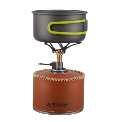 Camping stove with pot and brown fuel canister on a white background, featuring the Starcamp brand.