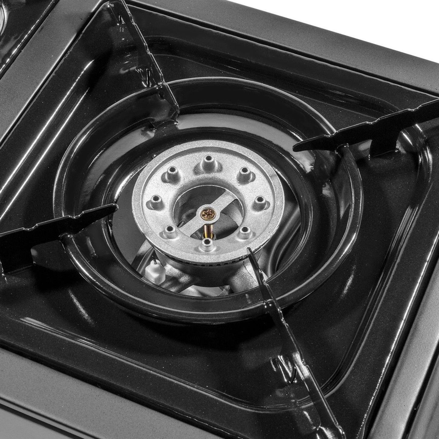 Close-up of a gas stove burner with visible flames.