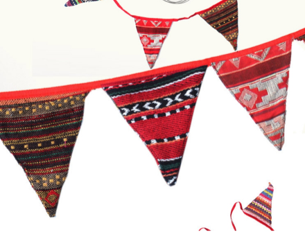 Ethnic boho pennant bunting folded to compact 17.5 x 14cm size for easy packing in camping bag or backpack