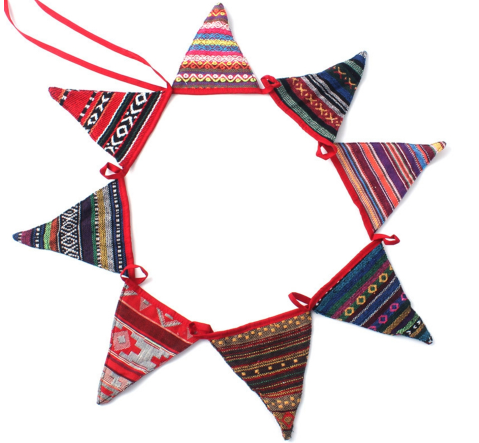 Close up of individual ethnic pennant flag showing bold multicolour geometric totem pattern on lightweight nylon fabric