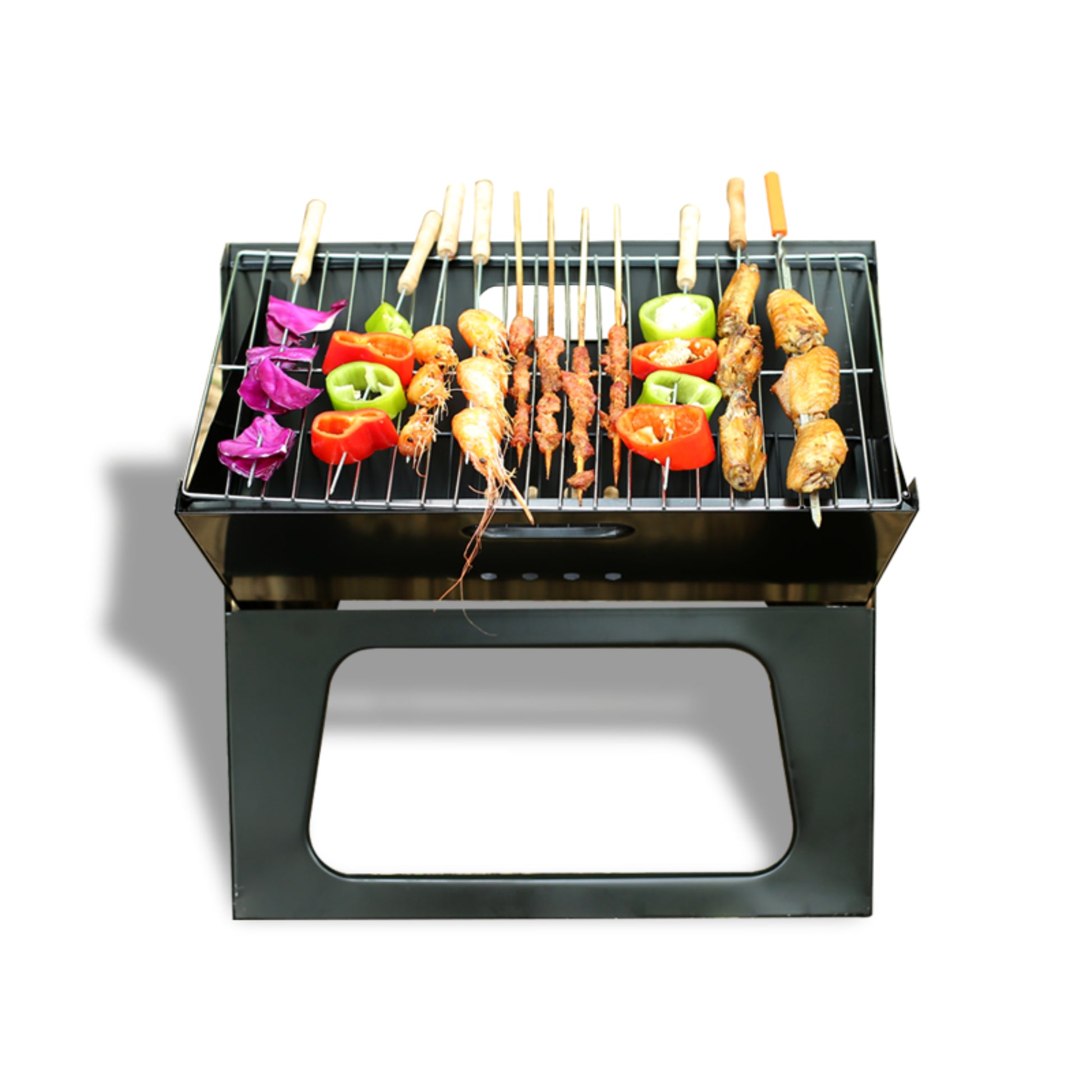 Portable grill with skewers of food on a white background