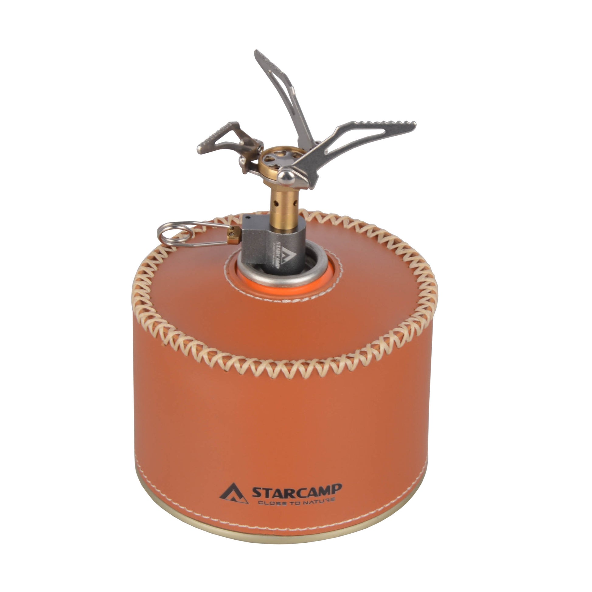 Camping stove with leather cover on a white background, featuring the Starcamp brand.