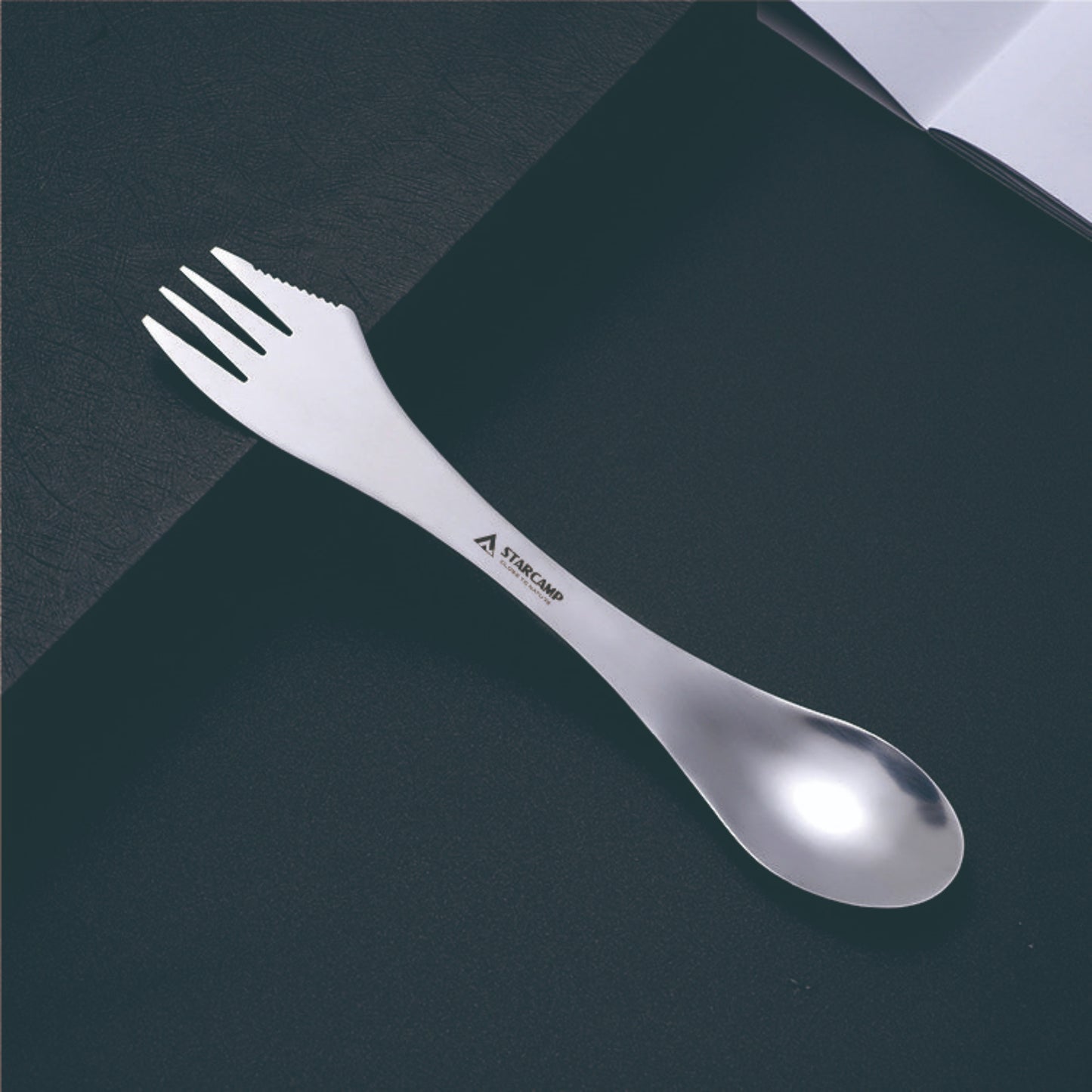 Close up of STARCAMP stainless steel camping spork deep polished spoon bowl end for outdoor eating
