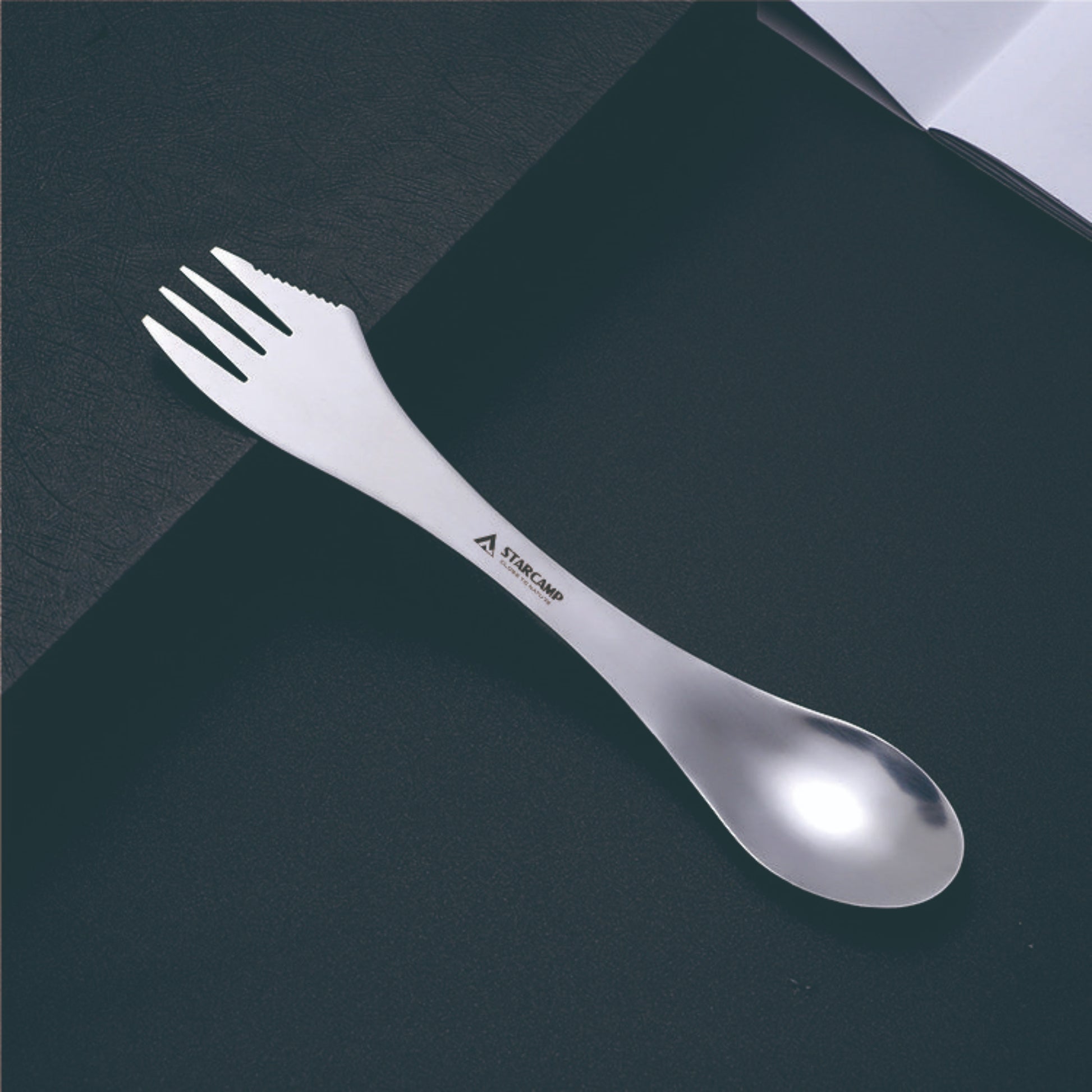 Close up of STARCAMP stainless steel camping spork deep polished spoon bowl end for outdoor eating