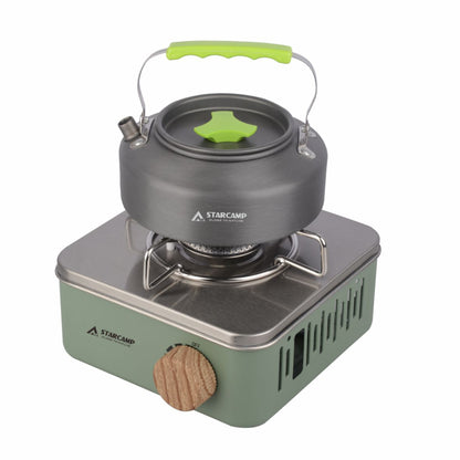 Camping stove with kettle on a white background