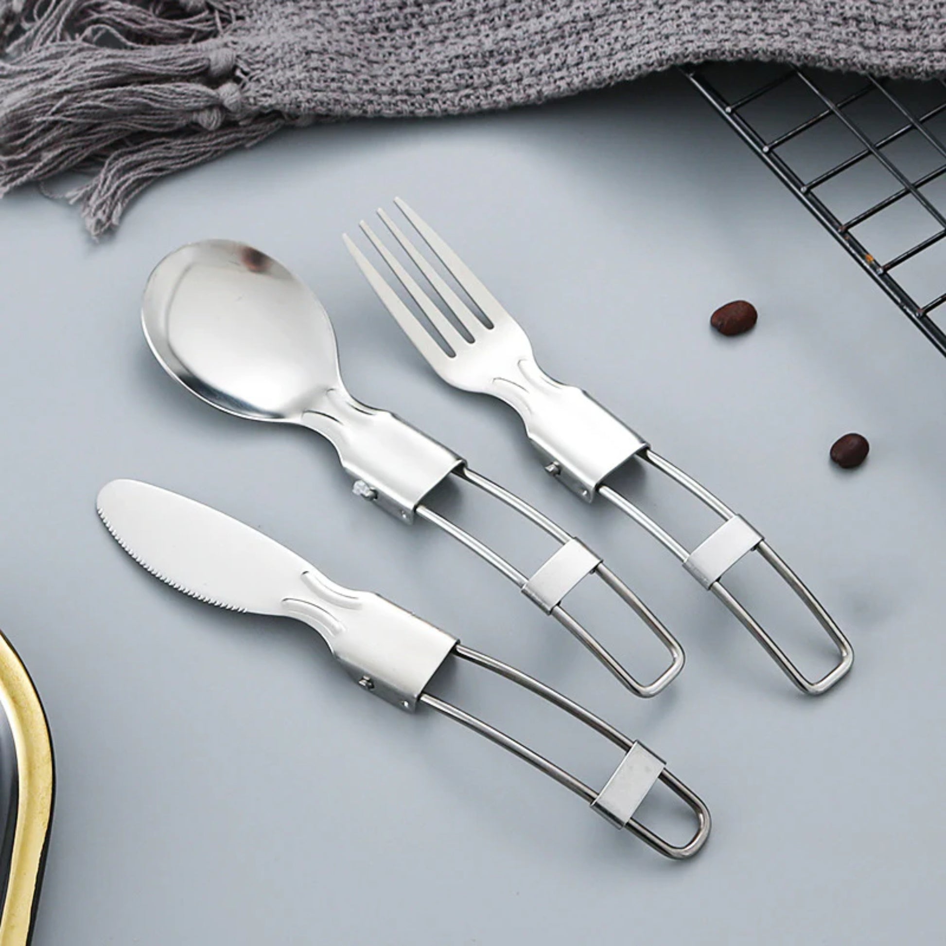 Close up of STARCAMP folding cutlery stainless steel wire loop handle lightweight design