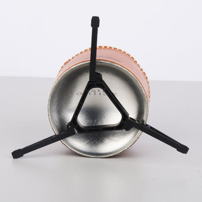 STARCAMP foldable canister stand fitted on standard butane gas canister showing stability for camping stove use