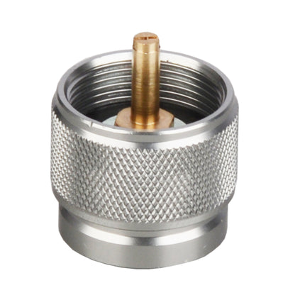 Top view of STARCAMP propane gas tank adapter showing recessed female screw-top connector for camping stoves