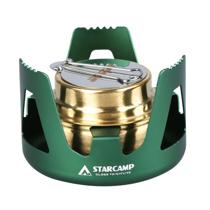 Green and gold camping stove with 'Starcamp' branding on a white background